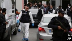 Turkish police gather outside the residence of the Saudi consul General Mohammed al-Otaibi to conduct a search after the disappearance and alleged slaying of writer Jamal Khashoggi, in Istanbul, Oct. 17, 2018.