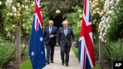 Thủ tướng Australia Scott Morrison và Thủ tướng Anh Boris Johnson tại London hôm 15/6/2021.