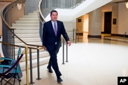 House Intelligence Committee Chairman Rep. Devin Nunes, R-California, walks to the House Intelligence Committee hearing room on Capitol Hill in Washington, Jan. 17, 2018.