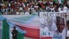 FILE - A soldier stands guard during a launch campaign by the ruling All Progressives Congress (APC) party for President Muhammadu Buhari's re-election bid, in Uyo, Nigeria, Dec. 28, 2018.