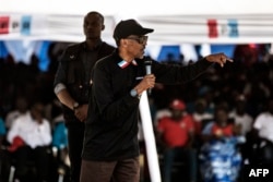 FILE - Incumbent Rwandan President Paul Kagame gives a speech during a campaign rally, July 31, 2017 in Gakenke, Rwanda, ahead of August 4 presidential election.