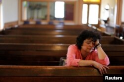 Immigrant Rosa Sabido sits in the United Methodist Church in which she lives while facing deportation in Mancos, Colorado, July 19, 2017.