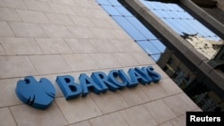FILE - Barclays Africa Group, with this building in Johannesburg, is weighing whether to pull its operations out of Africa. 