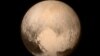 Pluto Up Close: Spacecraft Achieves Flyby, Then Calls Home