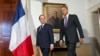 President Barack Obama, right, and French President Francois Hollande, left, walk in before speaking to members of the media following their tour of Monticello, President Thomas Jefferson’s estate, Monday, Feb. 10, 2014.