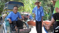 Oum Sok began working as a cyclo driver when he was 18. He says the city has become very expensive over the years, making it much harder to earn a living.