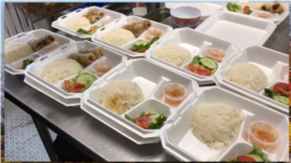 Meals being prepared by staff at Pho Luca's, Richmond, Virginia