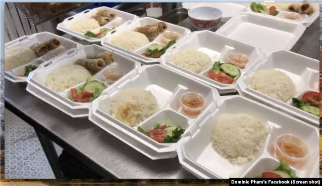 Meals being prepared by staff at Pho Luca's, Richmond, Virginia