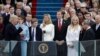 Donald Trump is sworn in as the 45th president of the United States by Chief Justice John Roberts as Melania Trump and his family looks on during the 58th Presidential Inauguration at the U.S. Capitol in Washington, Jan. 20, 2017. 