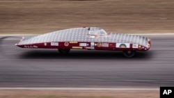 The Mississippi Choctaw High School Solar Car Team, one of several from the U.S., competes during the qualification lap for the 2017 World Solar Challenge at Hidden Valley race track in Darwin, Australia, Oct. 7, 2017.