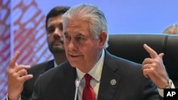 FILE - U.S. State Secretary Rex Tillerson gestures before the 10th Lower Mekong Initiative Ministerial Meeting, part of the Association of Southeast Asian Nations (ASEAN) Regional Forum in Manila, Philippines, Aug. 6, 2017. 