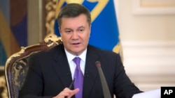 Ukrainian President Viktor Yanukovych speaks during a press conference in Kyiv, Dec. 19, 2013.