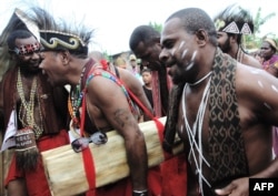 Tribesmen from Indonesia's Papua island participate in a gathering for indigenous communities in Tanjung Gusta, North Sumatra, on March 17, 2017.