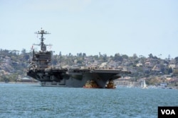 FILE - The Nimitz-class aircraft carrier USS Carl Vinson.