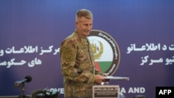 FILE - Commander of U.S. forces in Afghanistan, Army General John Nicholson, arrives ahead of a press conference in Kabul, Afghanistan, Nov. 20, 2017. 