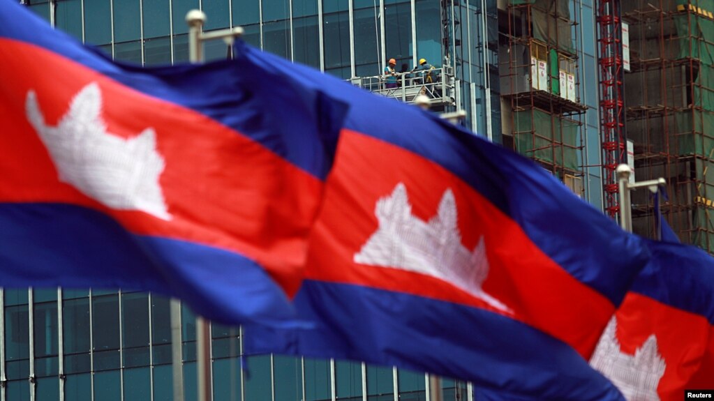 FILE - Cambodia's national flags are seen in Phnom Penh, Cambodia, Oct. 7, 2016.