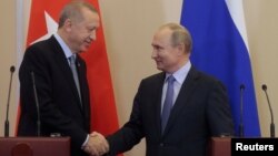 블라디미르 푸틴 러시아 대통령과 레제프 타이이프 에르도안 터키 대통령이 22일 러시아 소치에서 회담했다.