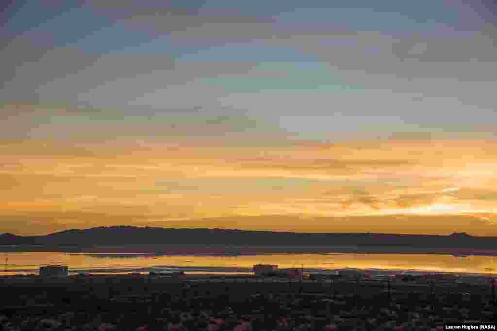 A sunrise photo of Edwards Air Force Base&rsquo;s Rogers Dry Lake was taken after heavy rainfall in southern California. NASA&rsquo;s Armstrong Flight Research Center is seen in the foreground.