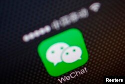 FILE - A picture illustration shows a WeChat icon in Beijing.