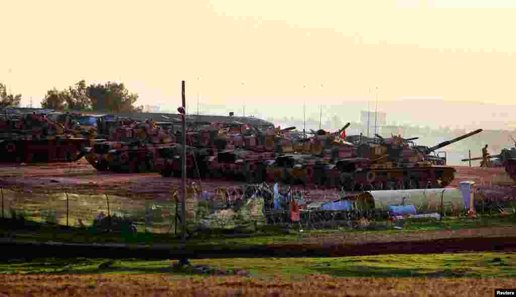 Tanks positioned at a military base on the Turkish-Syrian border near the town of Suruc, in Sanliurfa province, November 15, 2012. 