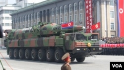 FILE - A North Korean military vehicle carries what is believed to be a Taepodong-class ballistic missile during a military parade in Pyongyang, April 15, 2012. 