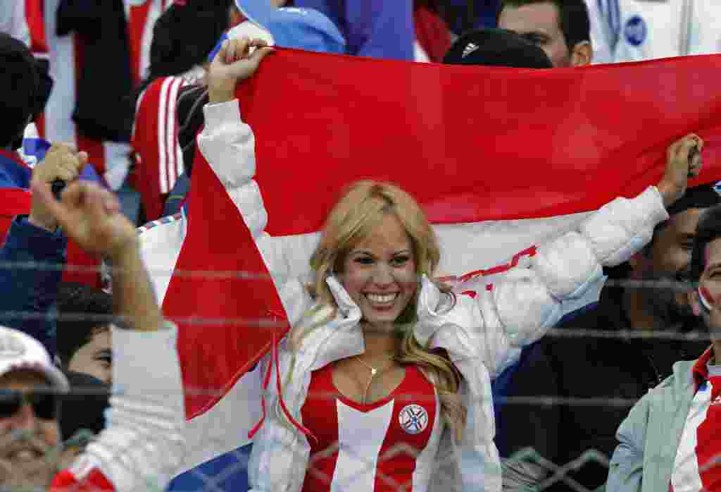 Paraguay' soccer fan Patty Orue cheers before the Copa America final soccer match in Buenos Aires, Argentina, Sunday, July 24, 2011. (AP Photo/Ricardo Mazalan)