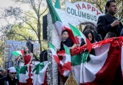 A Columbus Day parade in the Roman Catholic Diocese of Brooklyn which took place last year, October 14, 2019, in New York. (AP Photo/Bebeto Matthews)