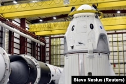 U.S. -- The Dragon crew capsule sits in the SpaceX hangar at Launch Complex 39-A, where the space ship and Falcon 9 booster rocket are being prepared for a January 2019 launch at Cape Canaveral, Florida, December 18, 2018