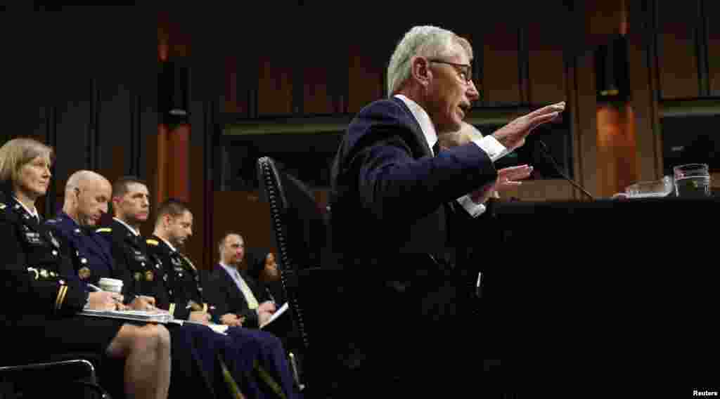 U.S. Secretary of Defense Chuck Hagel testifies during the Senate Armed Services Committee hearing on U.S. policy toward Iraq and Syria and the threat posed by the Islamic State on Capitol Hill, in Washington, Sept. 16, 2014. 