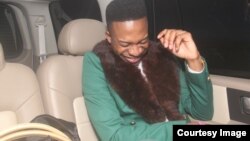 Abebayo Oke-Lawal has attracted the fashion world with designs like this green fur-collared coat he wore recently. Adebayo Oke-Lawal directs Orange Culture from his Lagos studio. (Photo Courtesy Orange Culture)