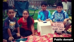 Children of immigration activists participate in the New Sanctuary Movement's "Un-Barbecue" for immigrant justice in Philadelphia, Pennsylvania on July 3, 2013. (Photo by Nicole Kligerman) 