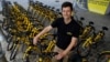 Ofo France general manager Laurent Kennel poses with city bike-sharing service Ofo bicycles at Autonomy and the Urban mobility summit in Paris, France, Oct. 19, 2017. 