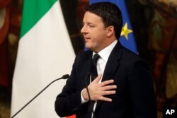 FILE - Former Prime Minister Matteo Renzi, shown during a press conference in Rome on Dec. 5, 2016, and who heads the ruling Democratic Party (PD), has said he wants a vote in June 2017.