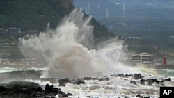 High waves crash on the eastern coast of Jeju Island, South Korea, as Typhoon Bolaven approaches the Korean Peninsula, Aug. 27, 2012. 