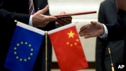 A European trade group says there is opposition to giving China Market Economy Status. The move would further reduce trade barriers put in place by the 28-member bloc.