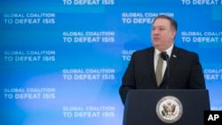 Secretary of State Mike Pompeo gives opening remarks during the Global Coalition to Defeat ISIS meeting, at the State Department in Washington, Feb. 6, 2019.