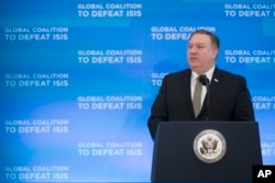 Secretary of State Mike Pompeo gives opening remarks during the Global Coalition to Defeat ISIS meeting, at the State Department in Washington, Feb. 6, 2019.