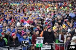 FILE - Thousands of people rally on the National Mall before the start of the 44th annual March for Life, Jan. 27, 2017, in Washington, D.C. The march is held to protest the 1973 Roe v. Wade decision that recognized a legal right to abortion.