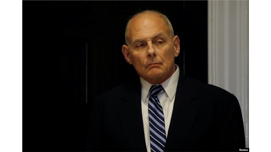 White House Chief of Staff John Kelly listens as President Donald Trump holds a round table meeting with members of law enforcement about sanctuary cities in the Roosevelt Room at the White House in Washington, March 20, 2018.