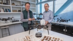 In this photo, Dr Stephen Pawson and Dr Graeme Woodward of New Zealand's University of Canterbury display their equipment used in their wireless solution for tracking insects using radar mounted on drones. (Photo Credit: University of Canterbury)
