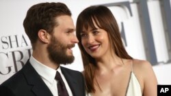 Jamie Dornan y Dakota Johnson en la Premiere británica de "50 Shades of Grey". Londres, 12 de febrero de 2015.