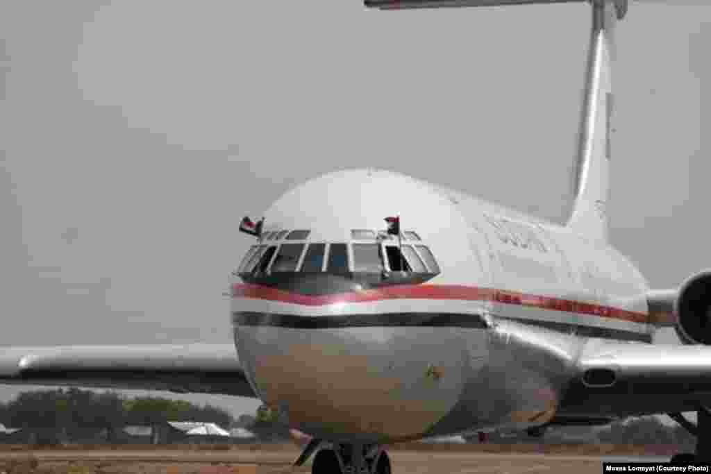 The plane carrying Sudanese President Omar al Bashir to his first visit of South Sudan taxis to a halt at Juba airport on Friday, April 12, 2013.
