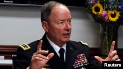 General Keith Alexander, director of the National Security Agency (NSA) and U.S. Cyber Command speaks to reporters during the Reuters Cybersecurity Summit in Washington, May 14, 2013. 