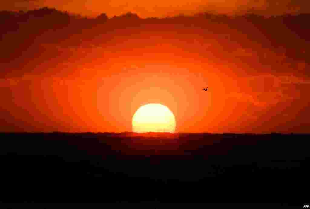 A view shows the sunset on the Mediterranean Sea on Feb. 3, 2019 in Marseille, southern France.