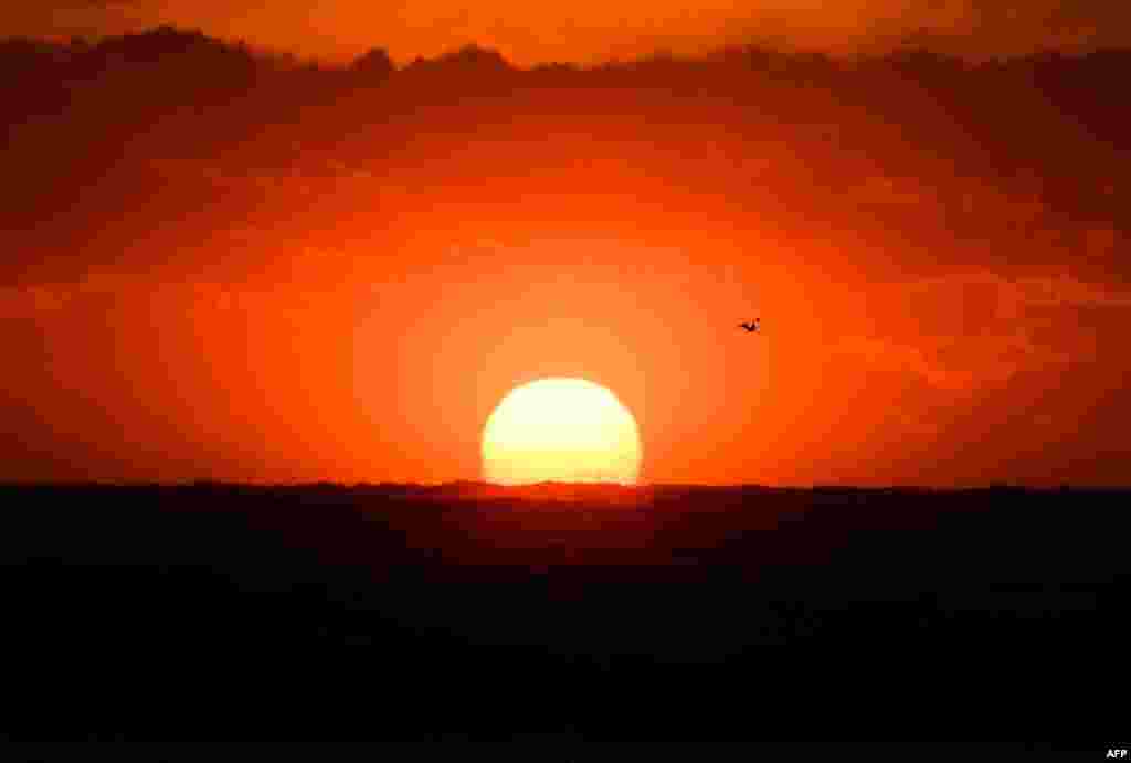 A view shows the sunset on the Mediterranean Sea on Feb. 3, 2019 in Marseille, southern France. 