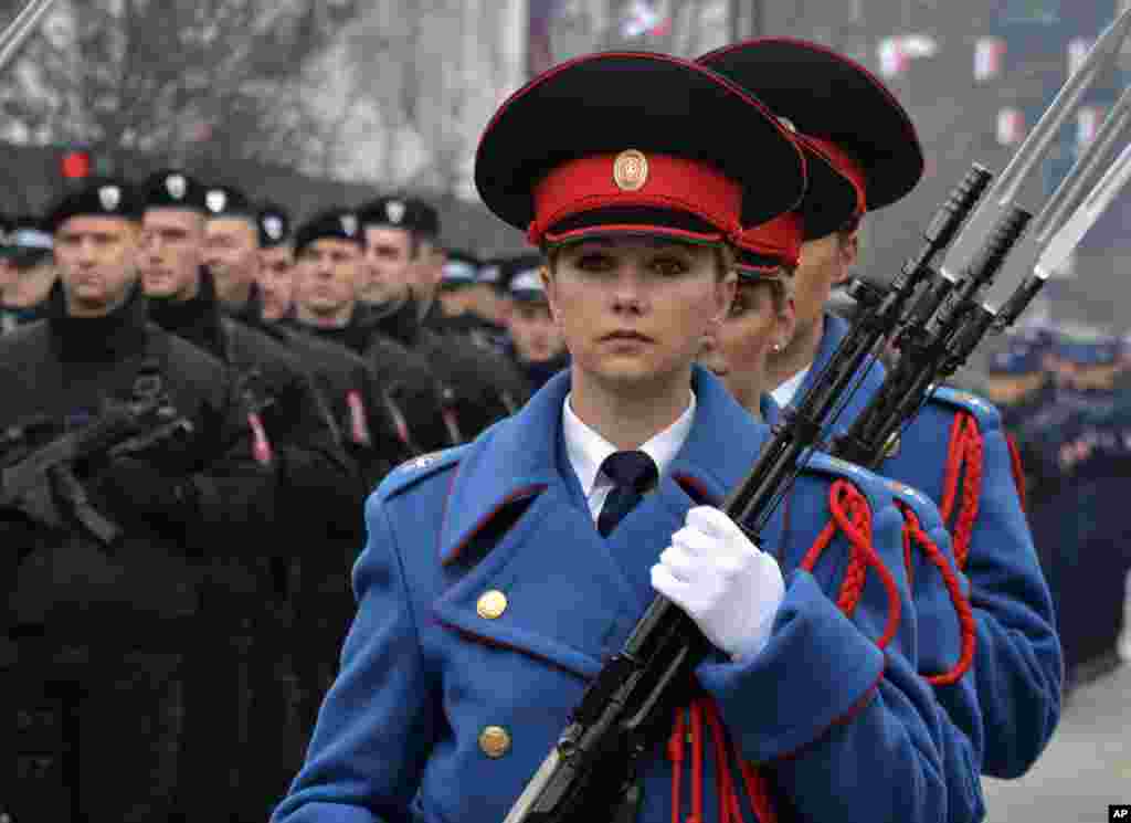 Members of the police forces of Republic of Srpska march during a parade marking the 30th anniversary of the Republic of Srpska in Banja Luka, northern Bosnia.