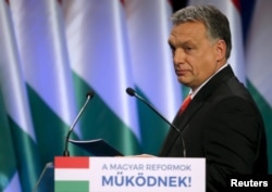 FILE - Hungarian Prime Minister Viktor Orban arrives to deliver his state-of-the-nation speech in Budapest, Hungary, Feb. 28, 2016. Orban has called U.S. presidential candidate Donald Trump an "upstanding candidate."