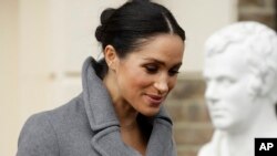 Meghan, Duchess of Sussex, leaves after visiting the Royal Variety Charity's residential nursing and care home Brinsworth House, in Twickenham, south west London, Dec. 18, 2018. 