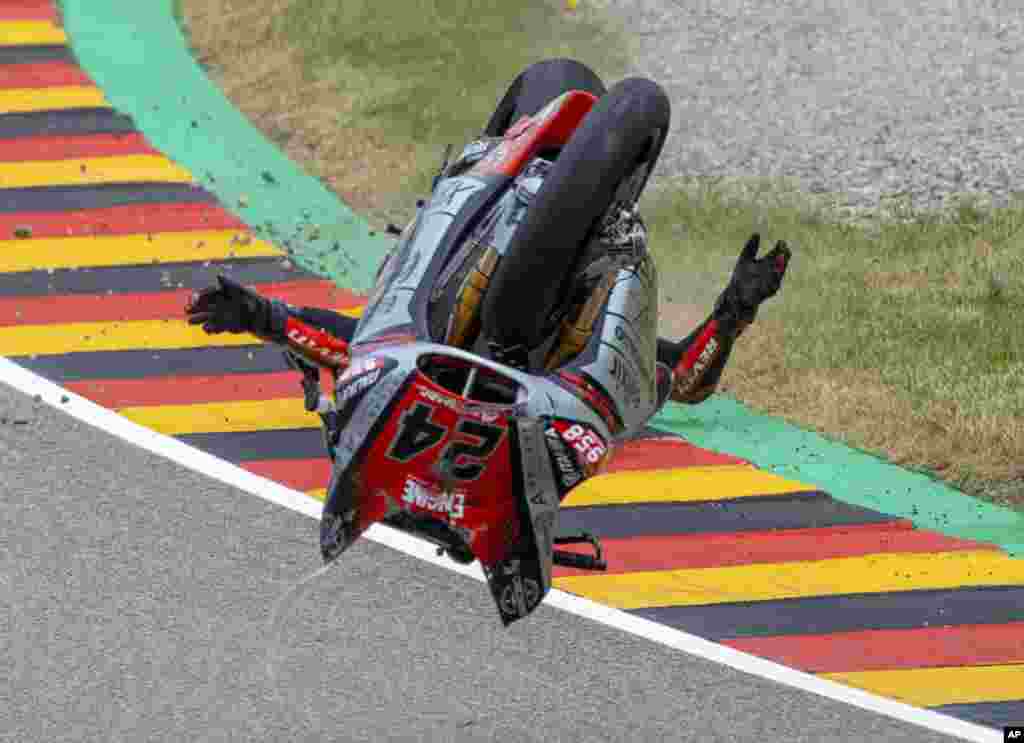 Italian rider Simone Corsi of Team Tasca Racing Scuderia crashes in the Moto2 race at the Sachsenring circuit in Hohenstein-Ernstthal, Germany.