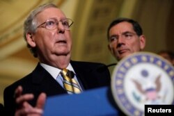 FILE - U.S. Senate Majority Leader Mitch McConnell speaks to the media on Capitol Hill in Washington, June 27, 2017.